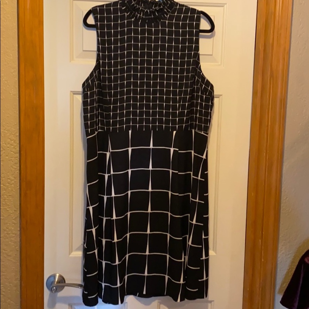 High neck. Sleeveless Dress